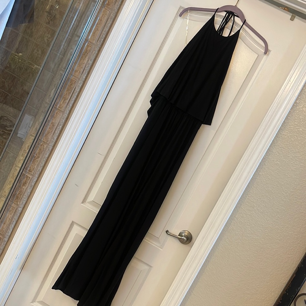 Brand new black pant cotton jumper, open back tie, neck.